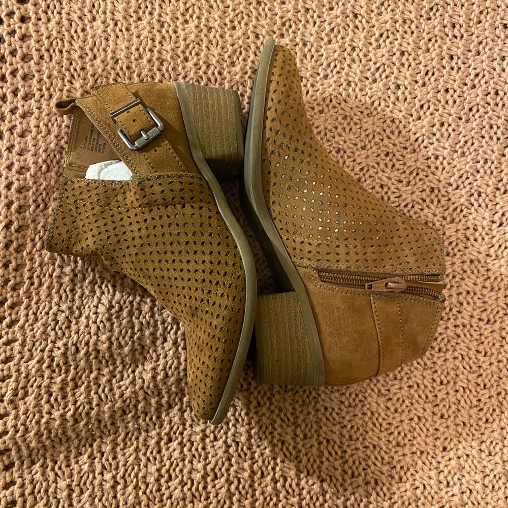 Perforated tan bootie with buckle